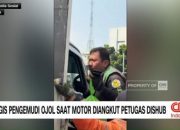 video:-tangis-pengemudi-ojol-saat-motor-diangkut-petugas-dishub