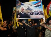 FOTO: Pasukan AS Angkat Kaki dari Irak, Warga Rayakan Kepergian