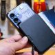 this-toolless-modular-lever-action-wallet-is-the-coolest-i’ve-stuck-to-my-phone