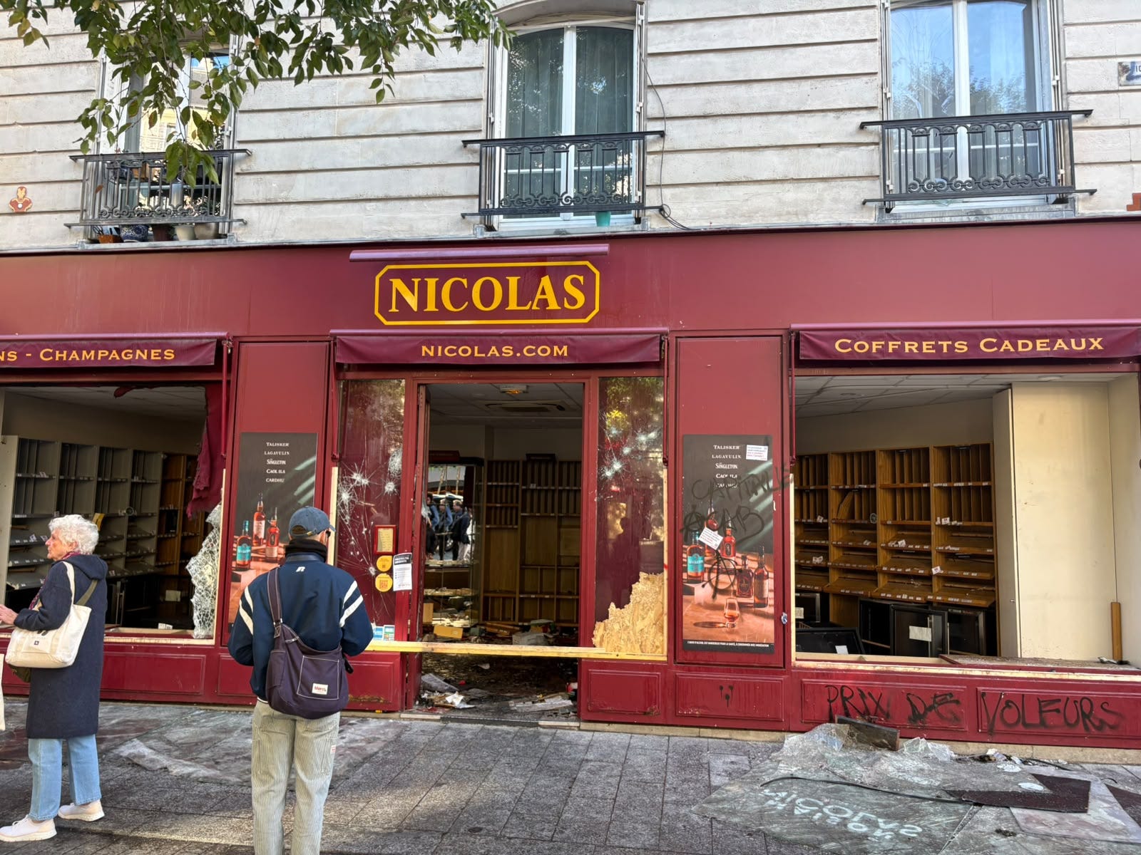 paris-business-owners-take-stock-as-riots-sweep-the-city:-‘they’d-taken-everything’